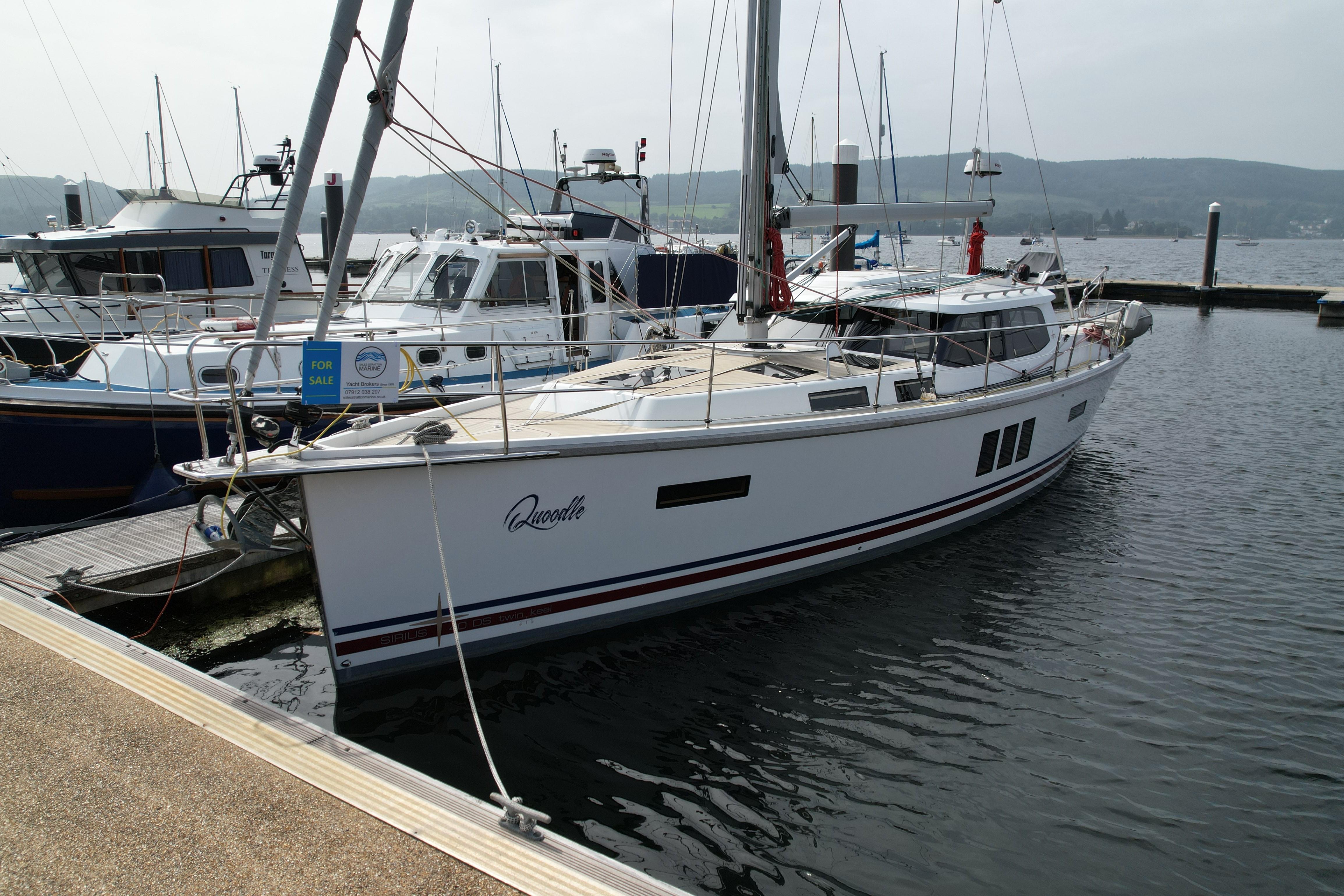 Sirius 40 DS 2016 Sirius 40 DS yacht docked, available for sale, in a marina setting.