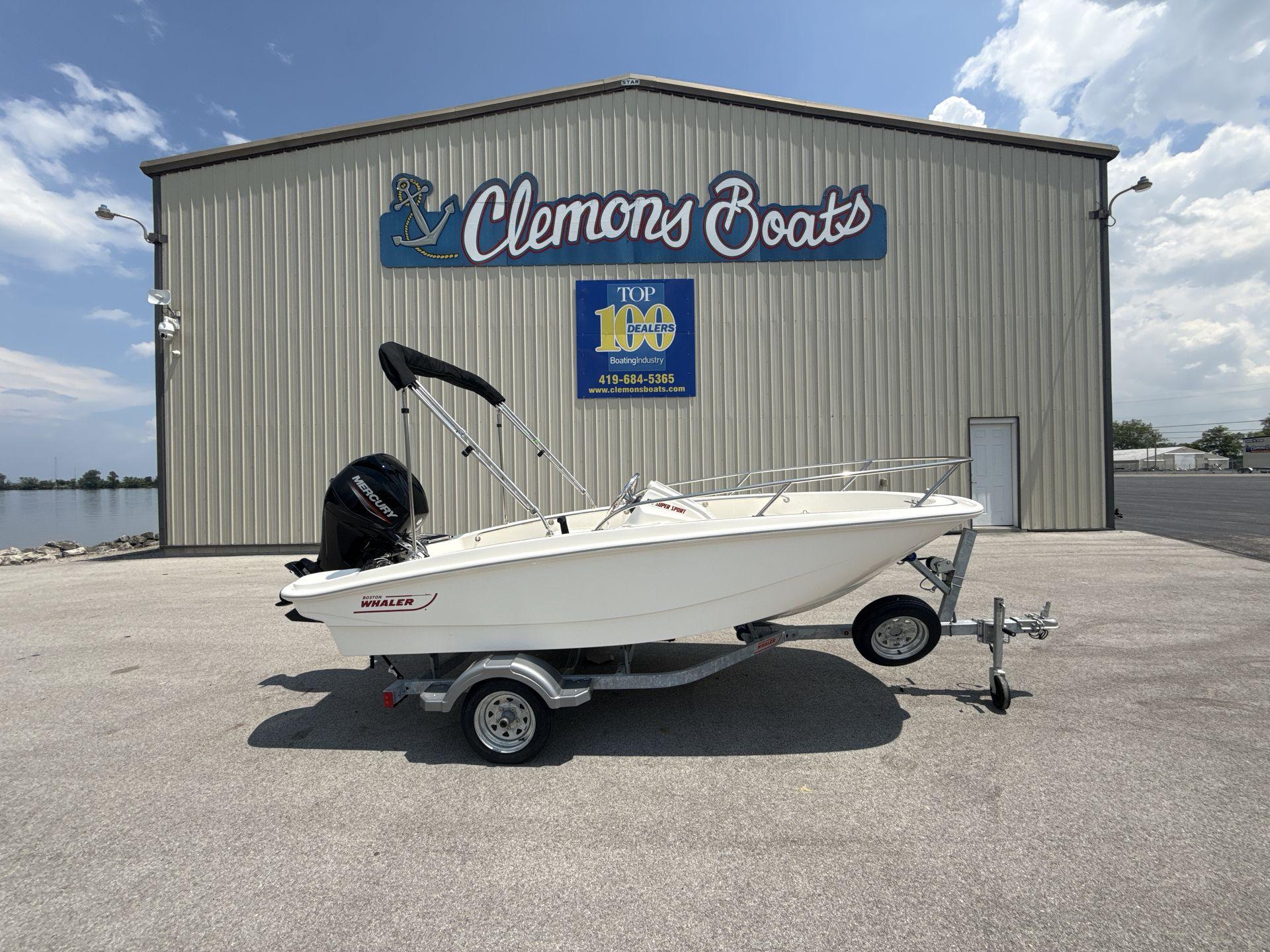 Boston Whaler 130 Super Sport 2025 Boston Whaler 130 Super Sport boat on trailer at Clemons Boats dealership.