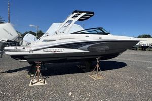 Monterey M-45 2026 Monterey M-45 boat on stands, featuring sleek design and Mercury outboard engines.