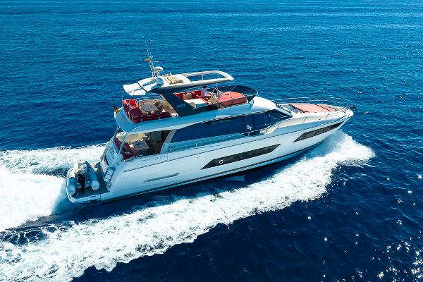 Prestige 680 Luxurious 2017 Prestige 680 yacht cruising on open blue sea.