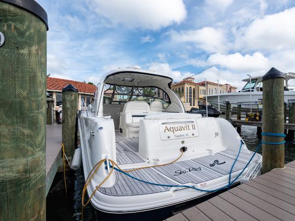 Sea Ray 390 Sundancer 2005 Sea Ray 390 Sundancer docked, featuring spacious deck and elegant design.