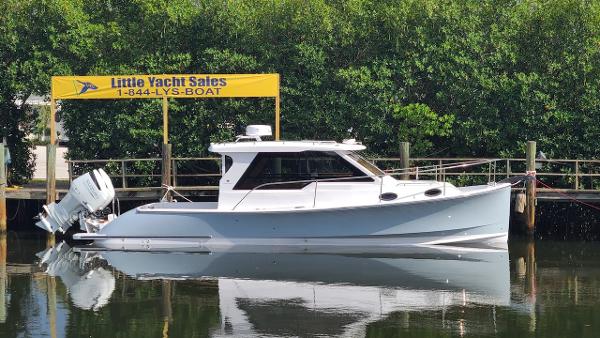 True North 34 Outboard Express True North 34-121 has a Shark Gray Hull