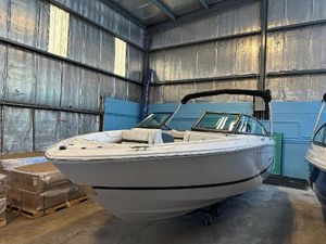 Regal LX2 2025 Regal LX2 boat in warehouse, sleek white design, modern features.