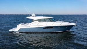 Tiara Yachts C44 Coupe 2016 Tiara Yachts C44 Coupe cruising on open water.