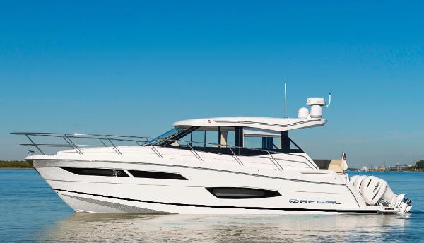 Regal 38 XO 2026 Regal 38 XO luxury yacht cruising on calm waters.
