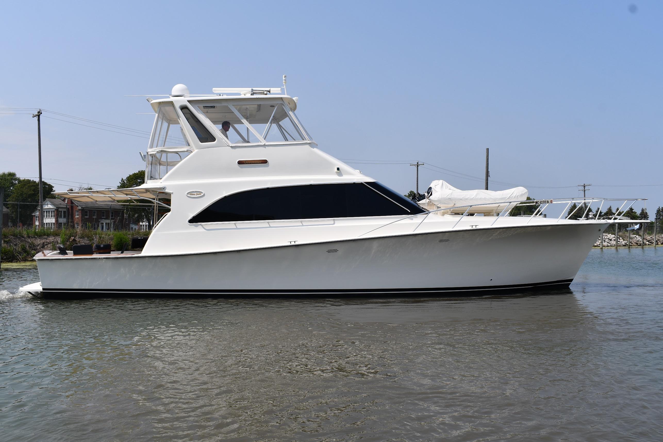 Ocean Yachts 53 Super Sport 1996 Ocean Yachts 53 Super Sport cruising on calm waters, side view.