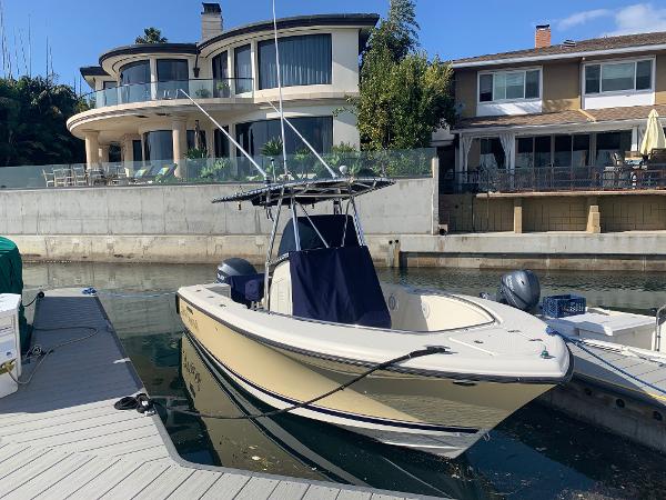 Pursuit C-23O CENTER CONSOLE At the Dock