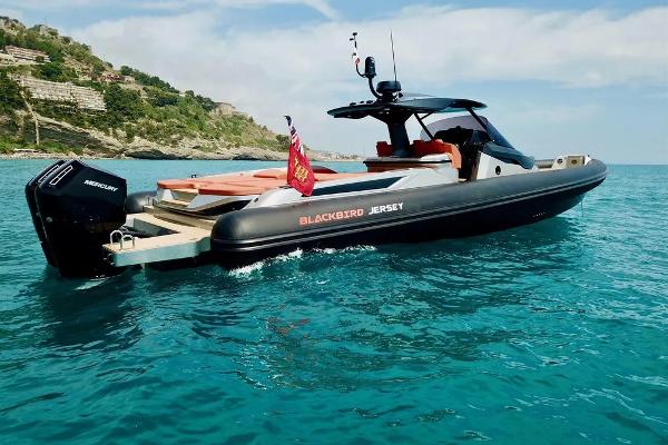 SACS Strider 15 FB 2023 SACS Strider 15 FB luxury boat on turquoise water, coastal background.