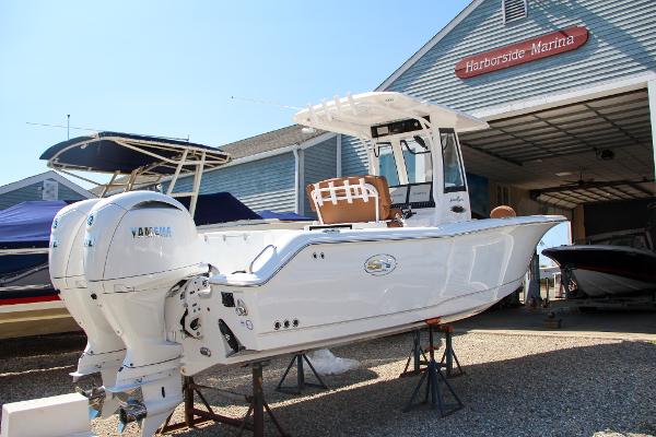 Sea Hunt Gamefish 25 2025 Sea Hunt Gamefish 25 boat at Harborside Marina, displayed on stands.