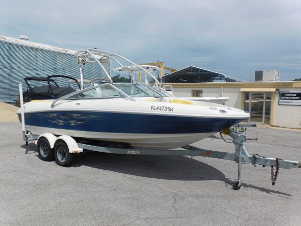 Sea Ray 205 Sport 2006 Sea Ray 205 Sport boat on trailer, parked outdoors.