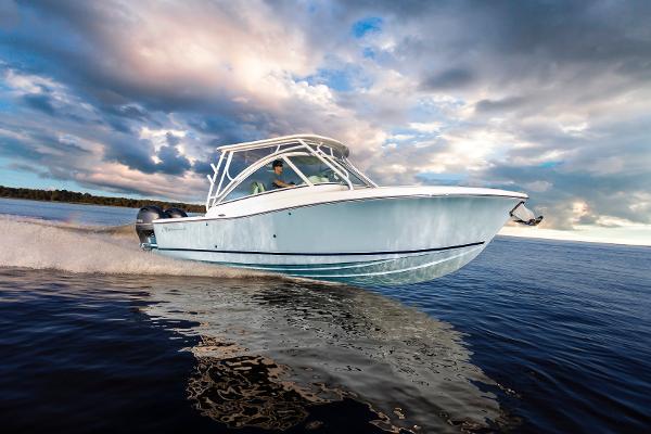 Albemarle 27 Dual Console 2023 Albemarle 27 Dual Console boat cruising on open water under a dramatic sky.