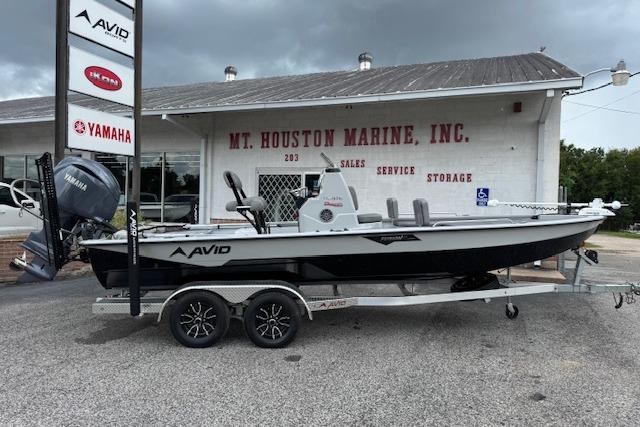 Avid 23 Fusion 2024 Avid 23 Fusion boat on trailer at Mt. Houston Marine dealership.
