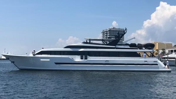 Broward 108 Raised Pilothouse 1997 Broward 108 Raised Pilothouse yacht on calm water with clear sky background.