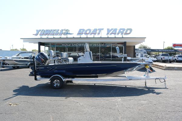 Xpress H20B 2025 Xpress H20B boat on trailer at Yowell's Boat Yard showroom.