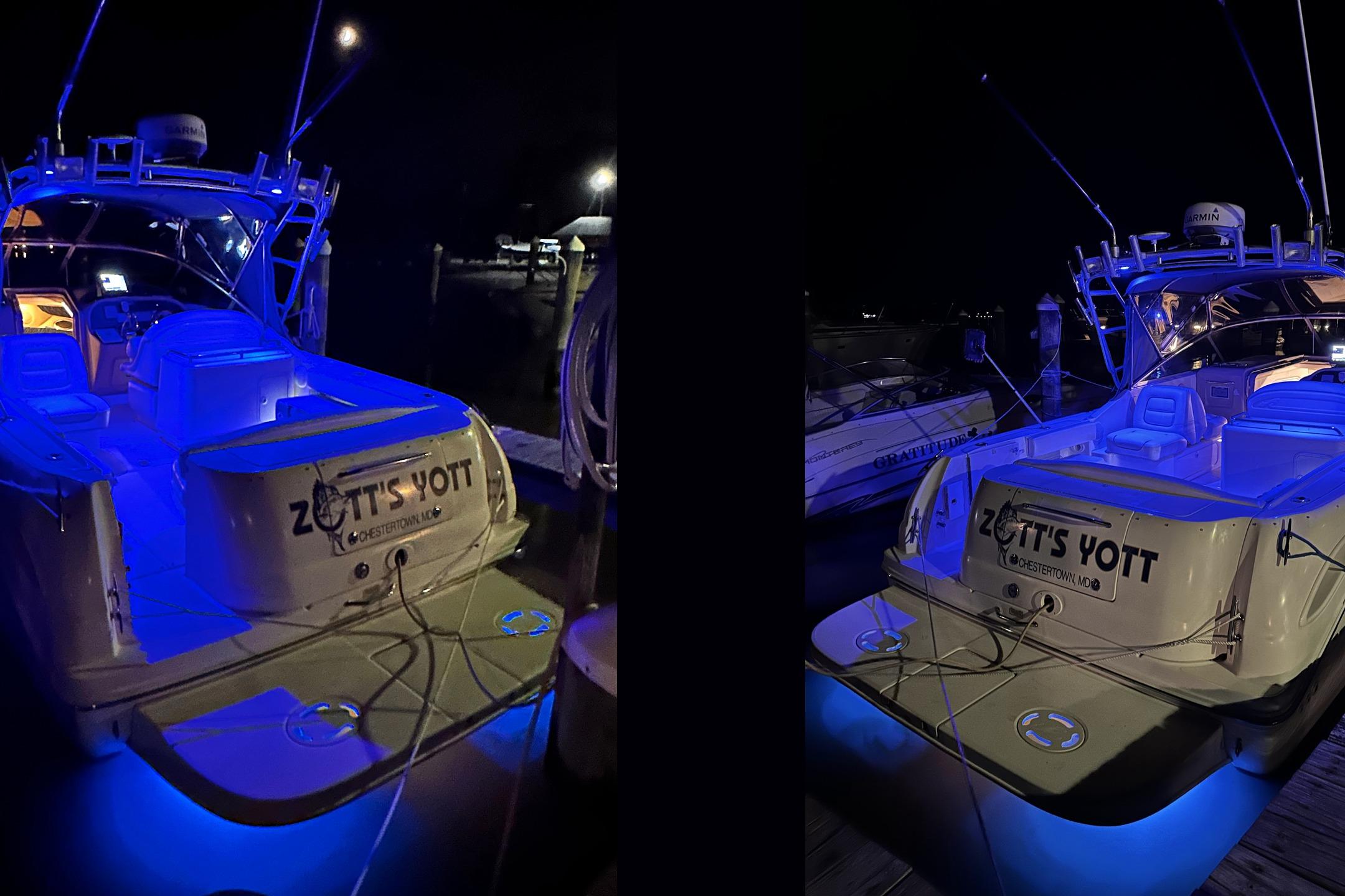 Sea Ray 290 Amberjack 2000 Sea Ray 290 Amberjack boat docked at night with blue LED lighting.