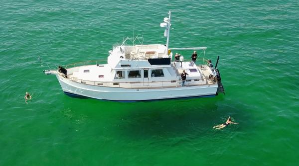 Grand Banks 46 Classic At Anchor on a lovely summers day