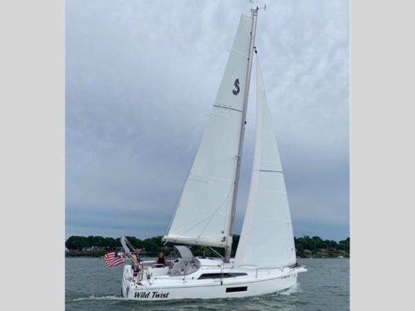 Beneteau Oceanis 30.1 Sailing yacht Beneteau Oceanis 30.1, 2020 model, on open water with sails up.
