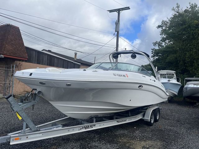 Hurricane SD 2690 OB 2016 Hurricane SD 2690 OB boat on trailer, parked outdoors, cloudy sky background.