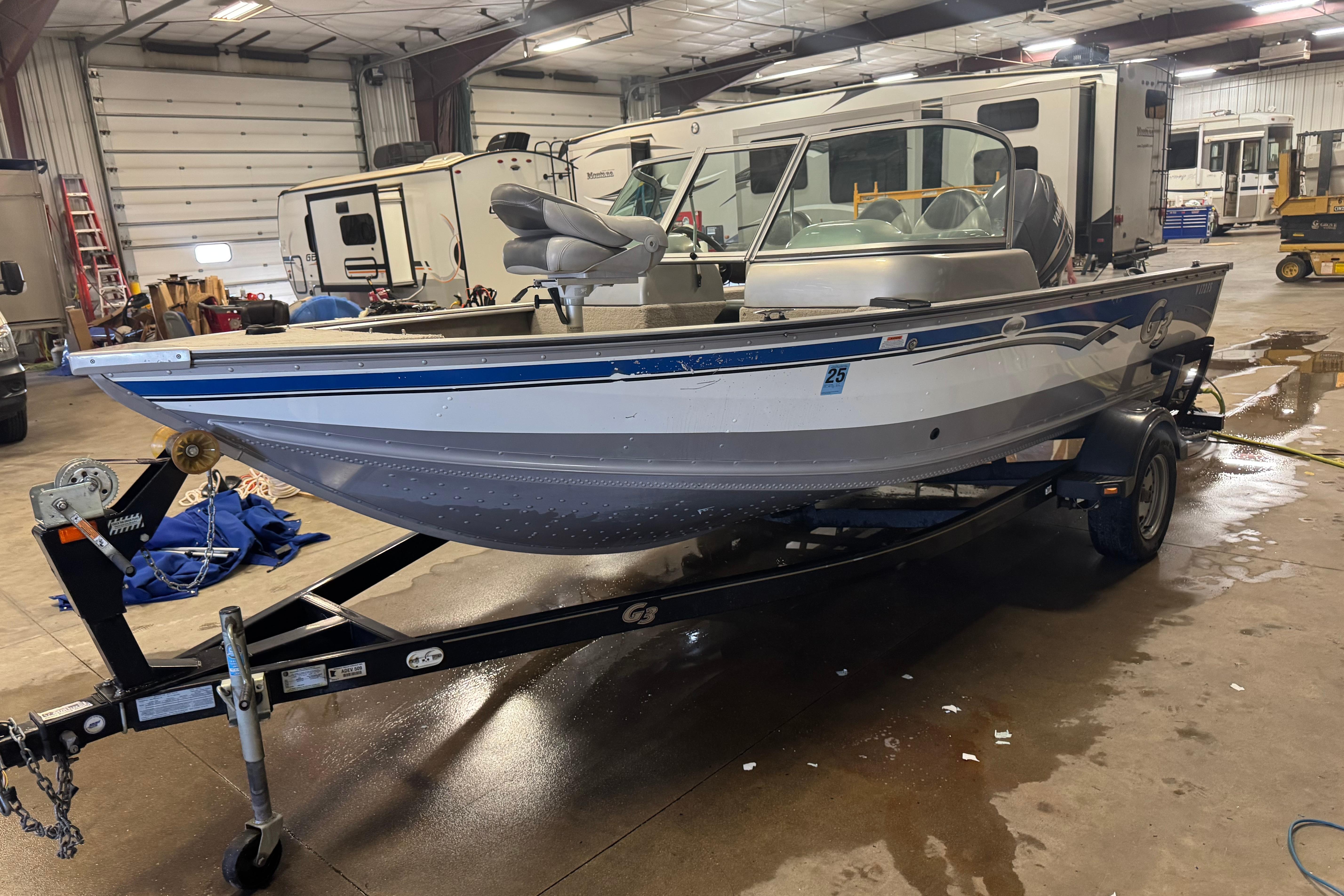 G3 Angler V172 FS 2011 G3 Angler V172 FS boat on trailer in indoor storage facility.