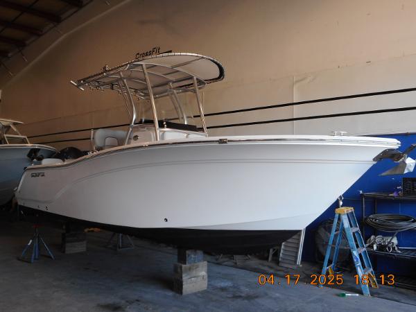 Sea Fox 228 Commander 2020 Sea Fox 228 Commander boat in a garage, elevated on blocks.