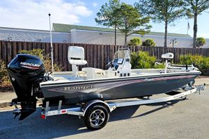 Ranger RB190 2024 Ranger RB190 boat with Mercury engine on trailer, parked outdoors.