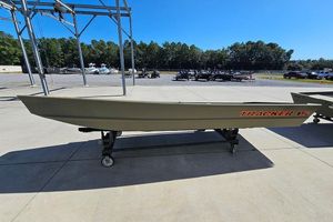 Tracker Grizzly 15 Jon 2026 Tracker Grizzly 15 Jon boat on display outdoors, showcasing its sleek design.