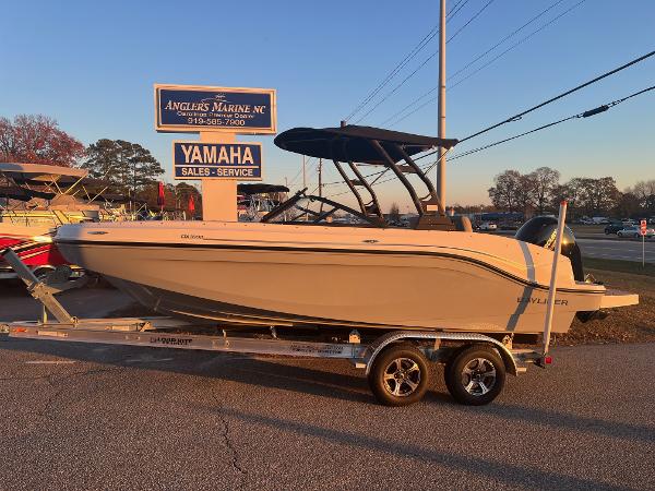 Bayliner DX2000 2024 Bayliner DX2000 boat on trailer at Anglers Marine NC dealership.