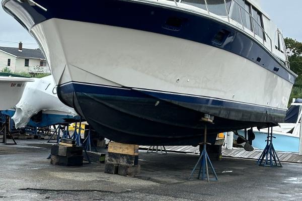 Silverton 40 Motor Yacht 1986 Silverton 40 Aft Cabin boat on stands for maintenance.