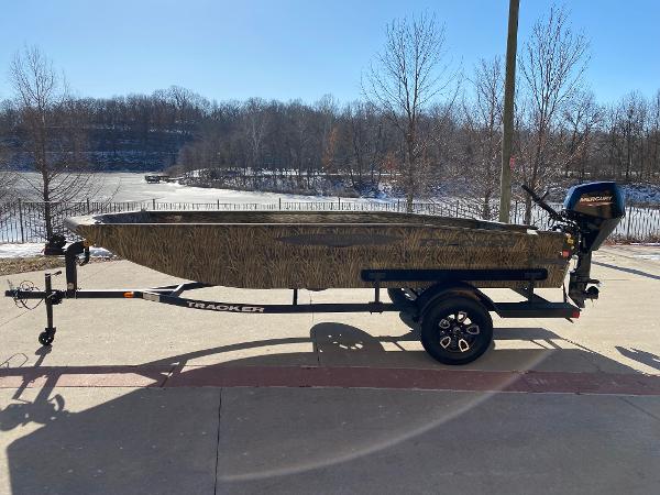 Tracker Grizzly 1650 T Prairie Wings Edition 2025 Tracker Grizzly 1650 T Prairie Wings Edition boat on trailer, outdoors in winter setting.