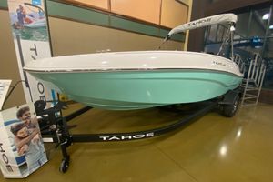 Tahoe T18 2026 Tahoe T18 boat on display, featuring a sleek design and mint green hull.