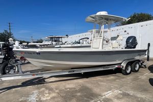 Pathfinder 2400 TRS 2016 Pathfinder 2400 TRS boat on trailer, parked outdoors under clear blue sky.