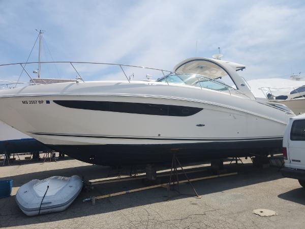 Sea Ray 370 Sundancer 2013 Sea Ray 370 Sundancer yacht on dry dock, side view.