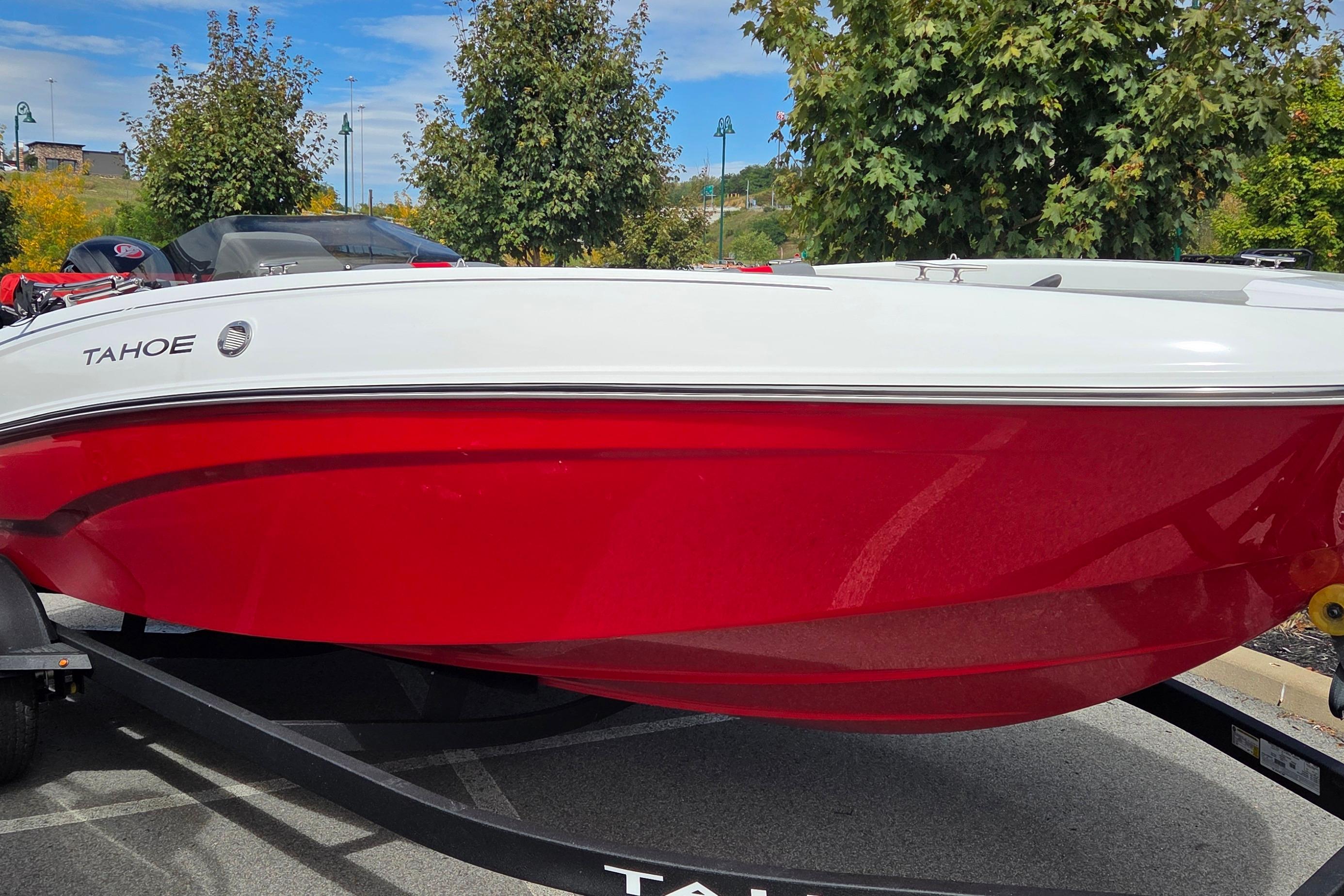 Tahoe T18 2026 Tahoe T18 boat with red and white exterior on a trailer.