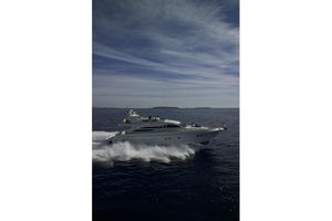 VZ 68 Luxury yacht VZ 68 cruising on open sea under a cloudy sky, 2004 model.