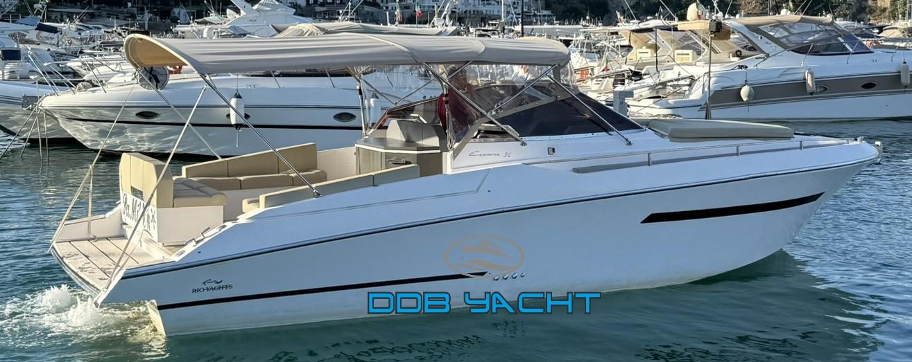 Rio Yachts Espera 34 2013 Rio Yachts Espera 34 cruising in a marina, featuring sleek design and spacious deck.