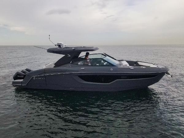 Cruisers Yachts 38 GLS 2022 Cruisers Yachts 38 GLS on open water, sleek design, side view.