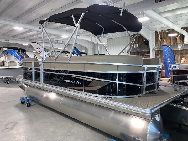 Starcraft LX20 R 2024 Starcraft LX20 R pontoon boat displayed indoors.