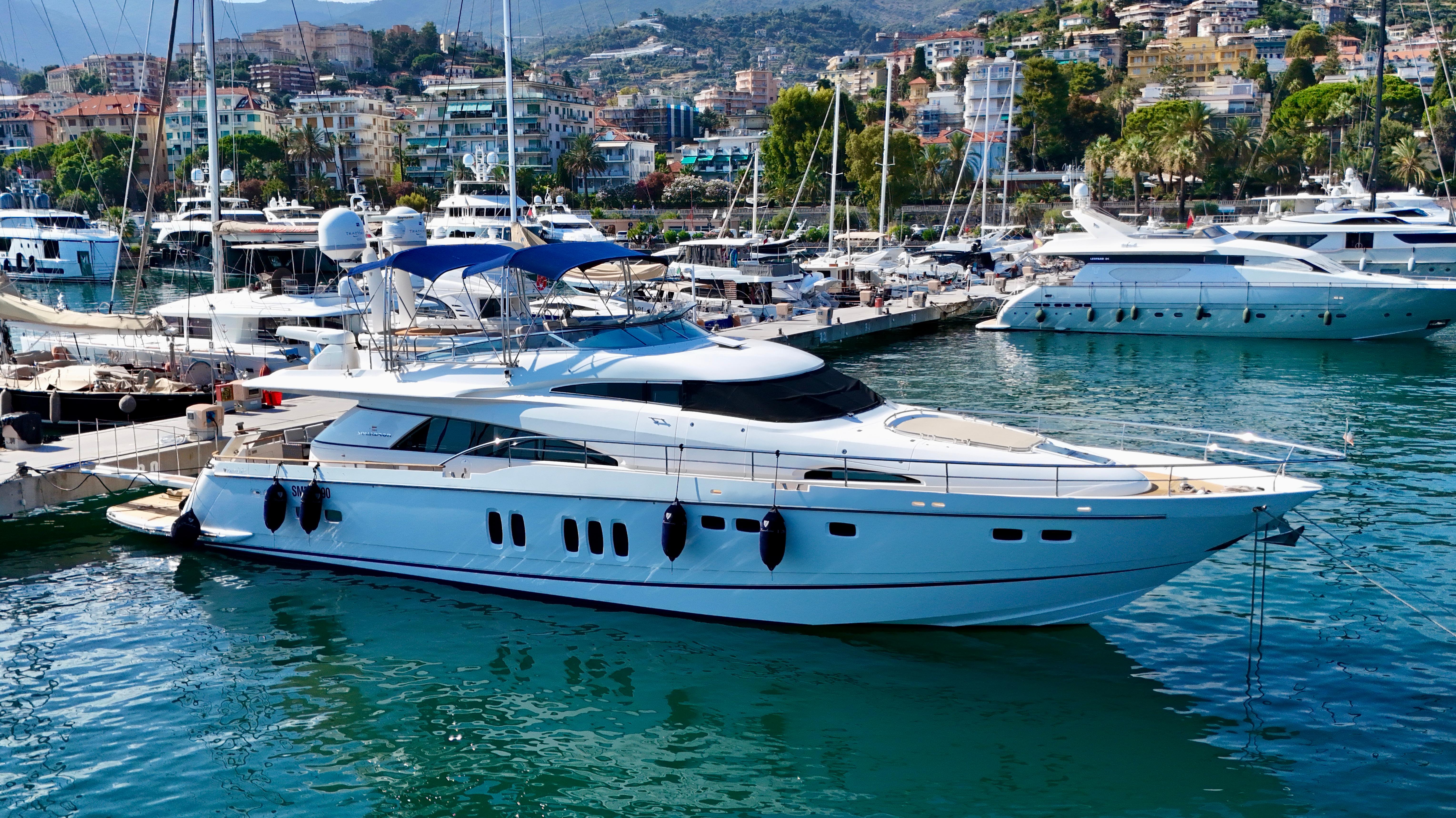 Fairline Squadron 78 Luxury 2008 Fairline Squadron 78 yacht docked in a scenic marina.