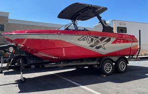 ATX Surf Boats 22 Type-S 2022 ATX Surf Boats 22 Type-S in red and silver on a trailer.