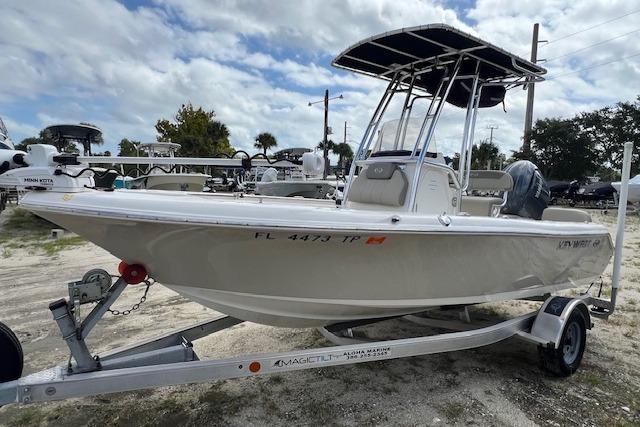 Key West 189 FS 2023 Key West 189 FS boat on trailer, parked outdoors under cloudy sky.