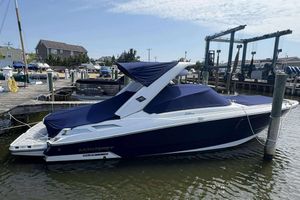 Monterey 298SS Super Sport 2017 Monterey 298SS boat docked at a marina, covered with a blue tarp.