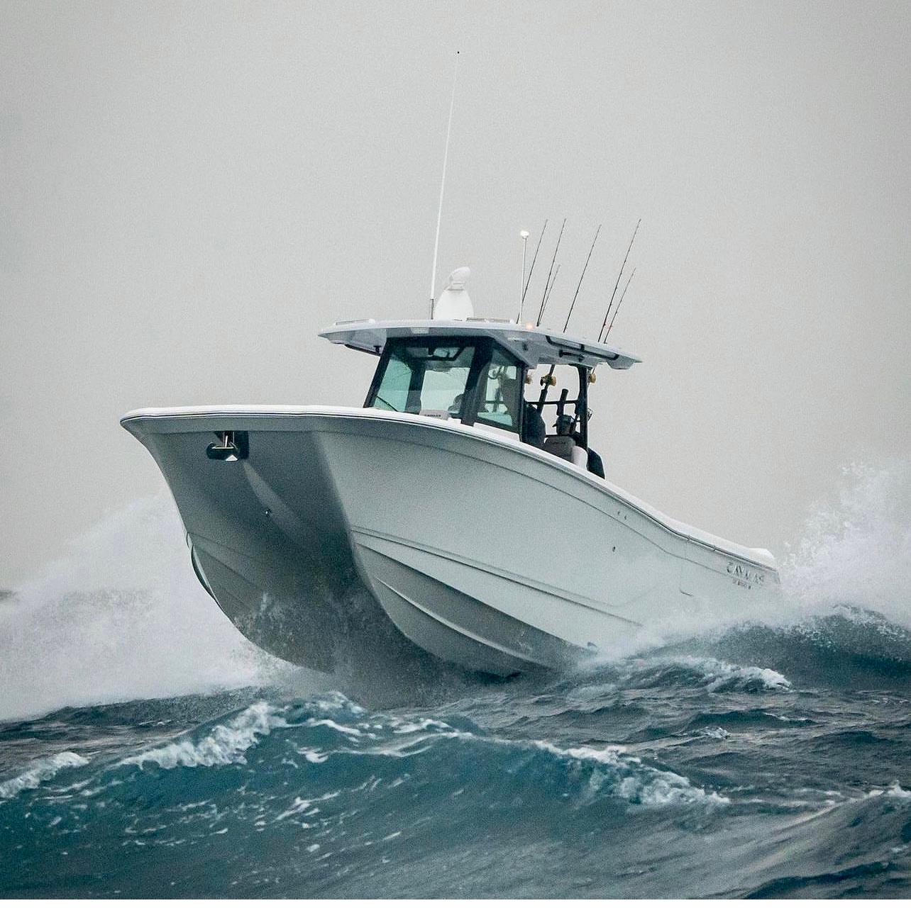 Caymas 30 CT 2024 Caymas 30 CT boat navigating rough waters.