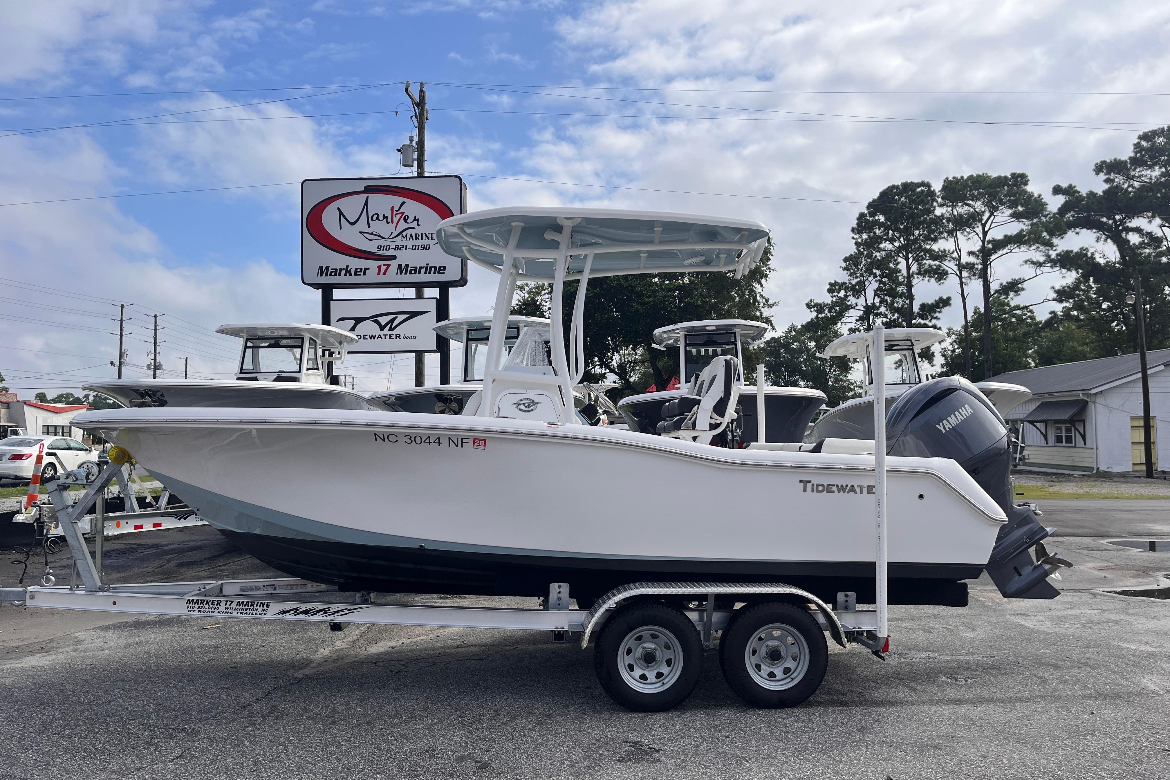 Tidewater 210 LXF 2024 Tidewater 210 LXF boat on trailer at Marker 17 Marine dealership.