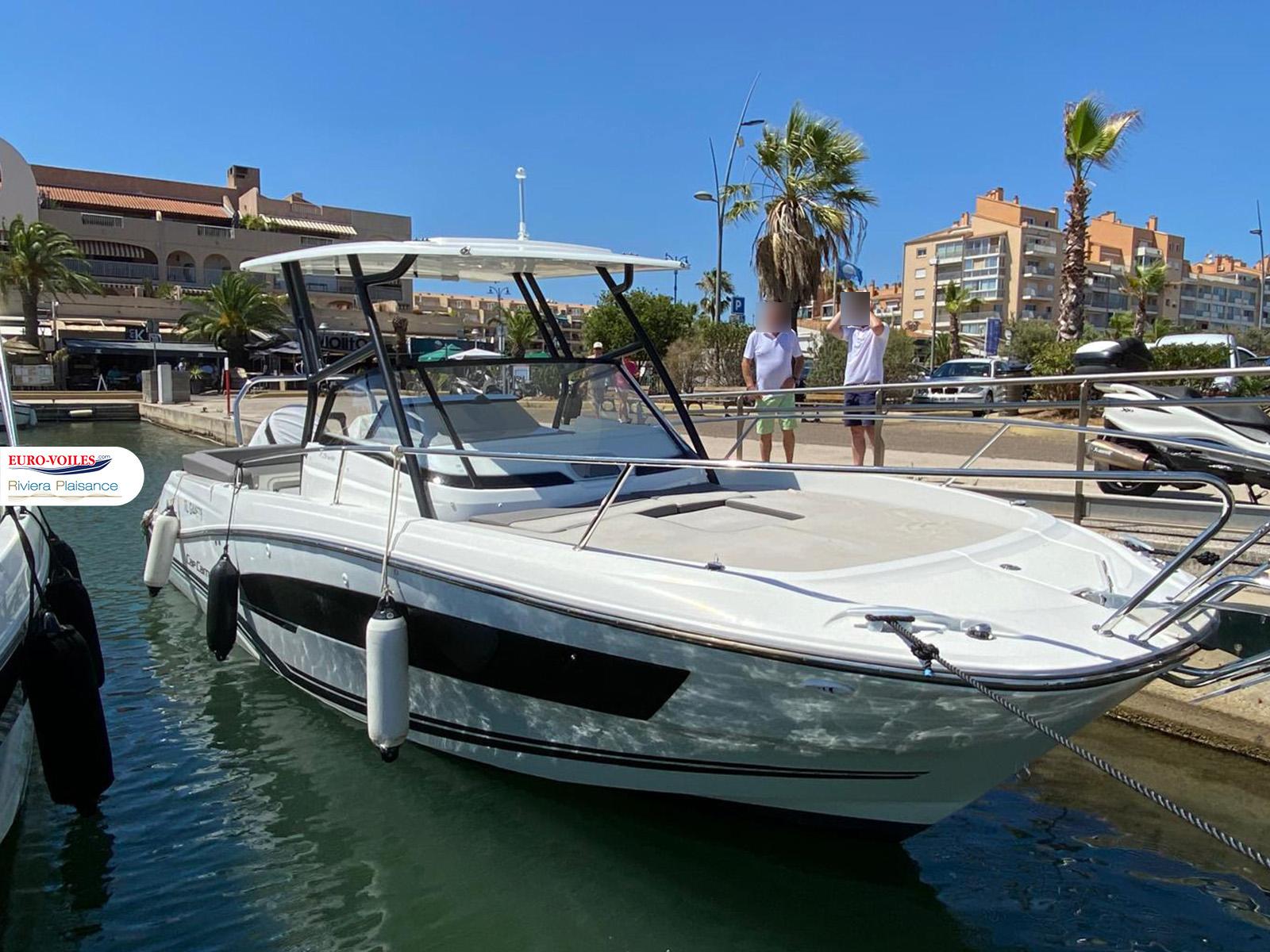 Jeanneau CAP CAMARAT 7.5 WA SERIE 3 2022 Jeanneau CAP CAMARAT 7.5 WA SERIE 3 docked in sunny marina.
