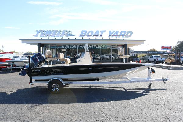 Xpress H20B 2025 Xpress H20B boat displayed at Yowell's Boat Yard dealership.