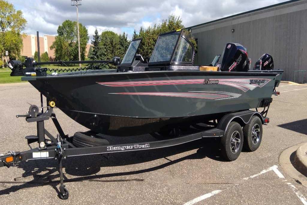 Ranger VX1888 WT 2024 Ranger VX1888 WT fishing boat on trailer, parked outdoors.