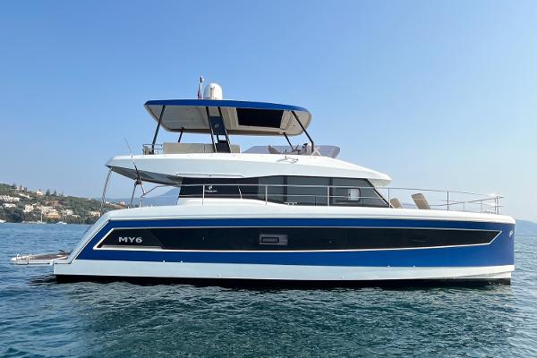 Fountaine Pajot MY6 2022 Fountaine Pajot MY6 yacht on calm sea, side view.
