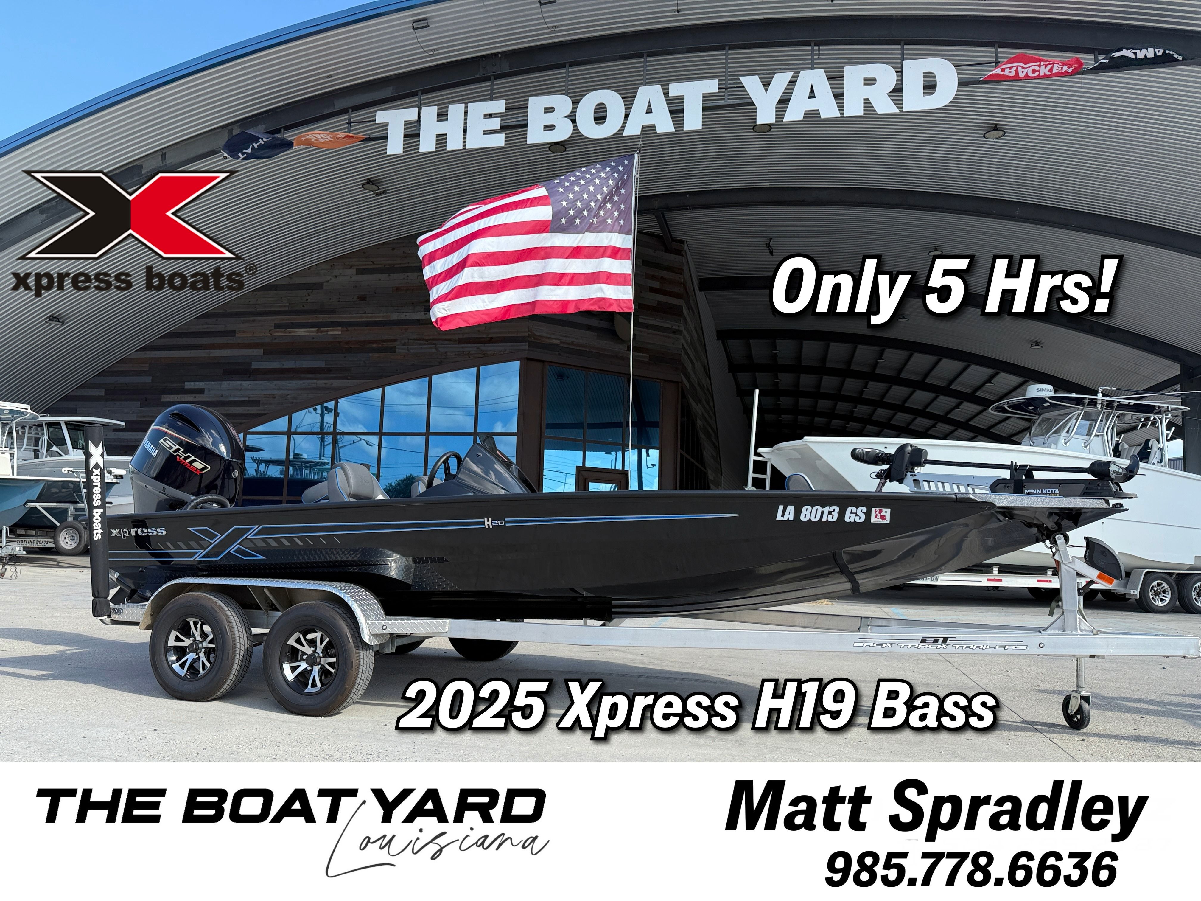 Xpress H20 Bass 2015 Xpress H20 Bass boat at The Boat Yard, Louisiana, with American flag and contact details.