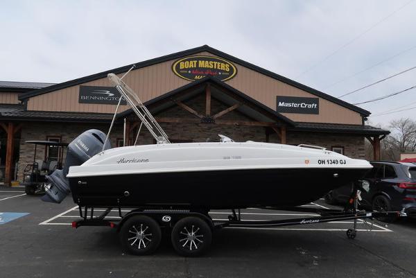 Hurricane SunDeck Sport 188 OB 2023 Hurricane SunDeck Sport 188 OB boat on trailer outside dealership.