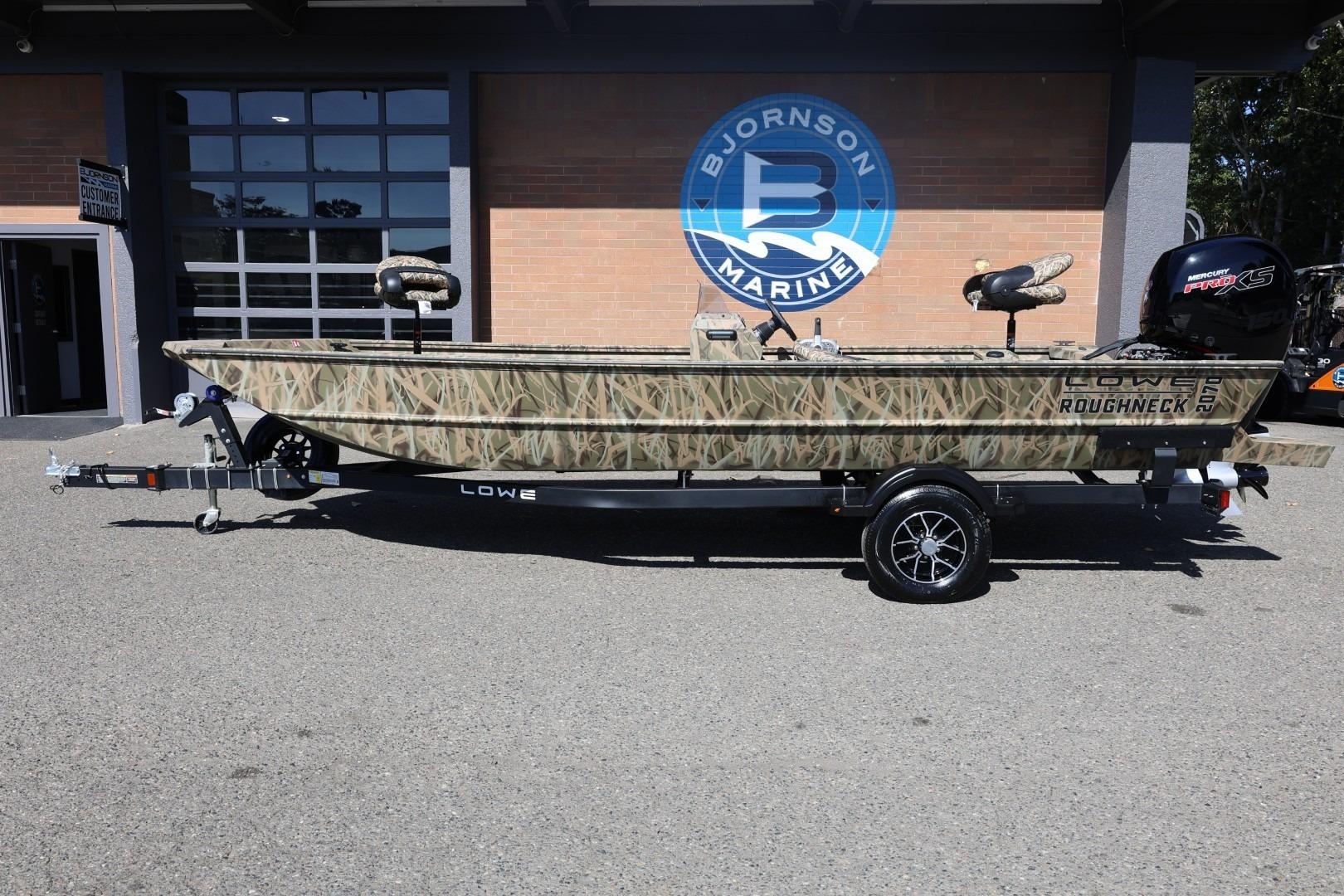 Lowe Roughneck RX2070 SC 2026 Lowe Roughneck RX2070 SC boat on trailer at Bjornson Marine dealership.